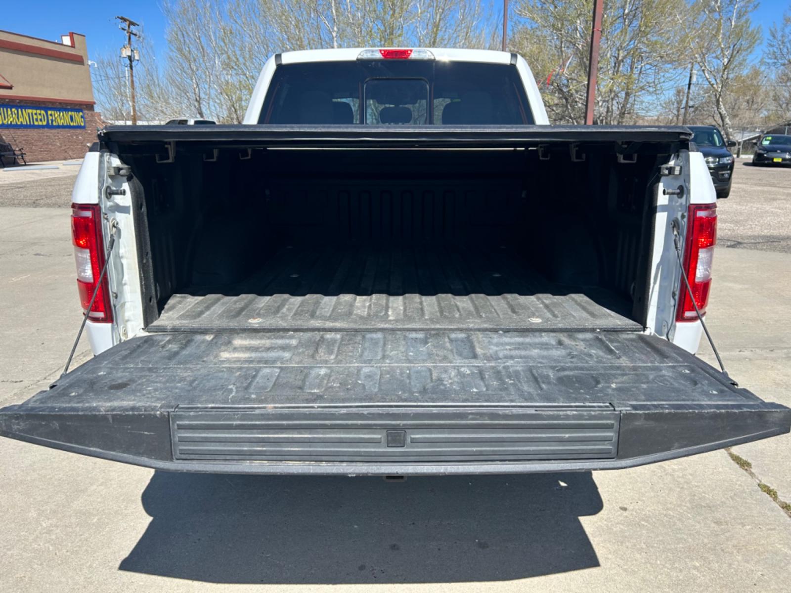 2019 White /BLACK Ford F-150 XLT SuperCrew 6.5-ft. Bed 4WD (1FTEW1E47KF) with an 3.5L V6 TURBO engine, 6A transmission, located at 3030 CY Ave, Casper, WY, 82604, (307) 265-3830, 42.827816, -106.357483 - Check out this beauty! It has the FX4 Off-Road Package, with remote start, and heated seats. Come see how to get into this truck, and be able to off-road with style! - Photo #6